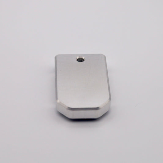 Close-up of machined aluminum base plate for PSA Micro Dagger magazines.